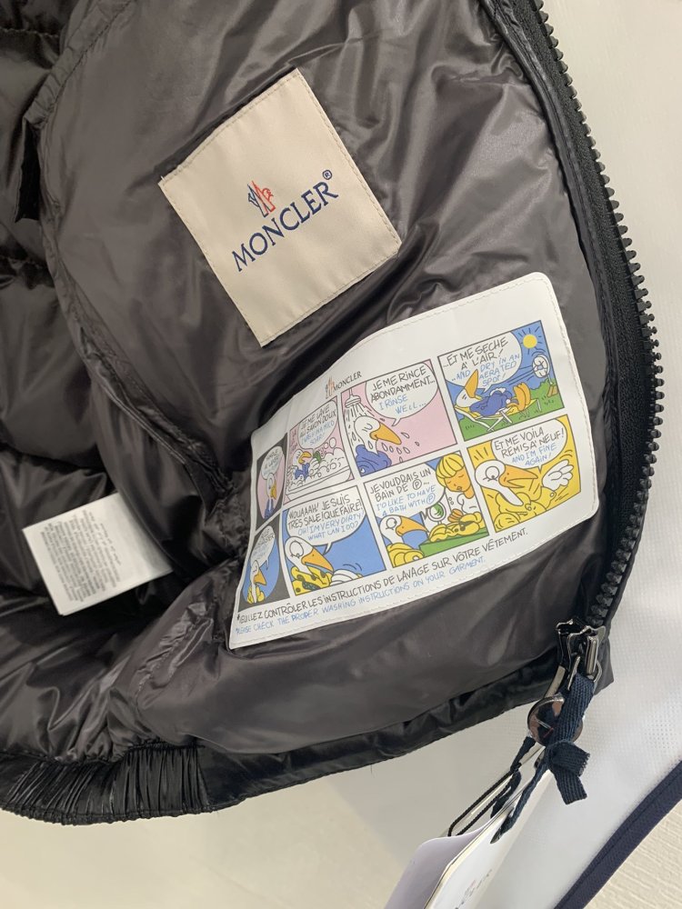 Жилетка на пуху жіноча фото 9