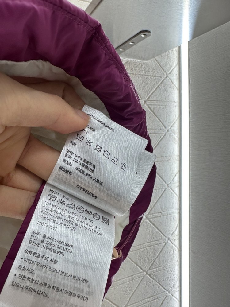 Жилетка на пуху женская фото 9