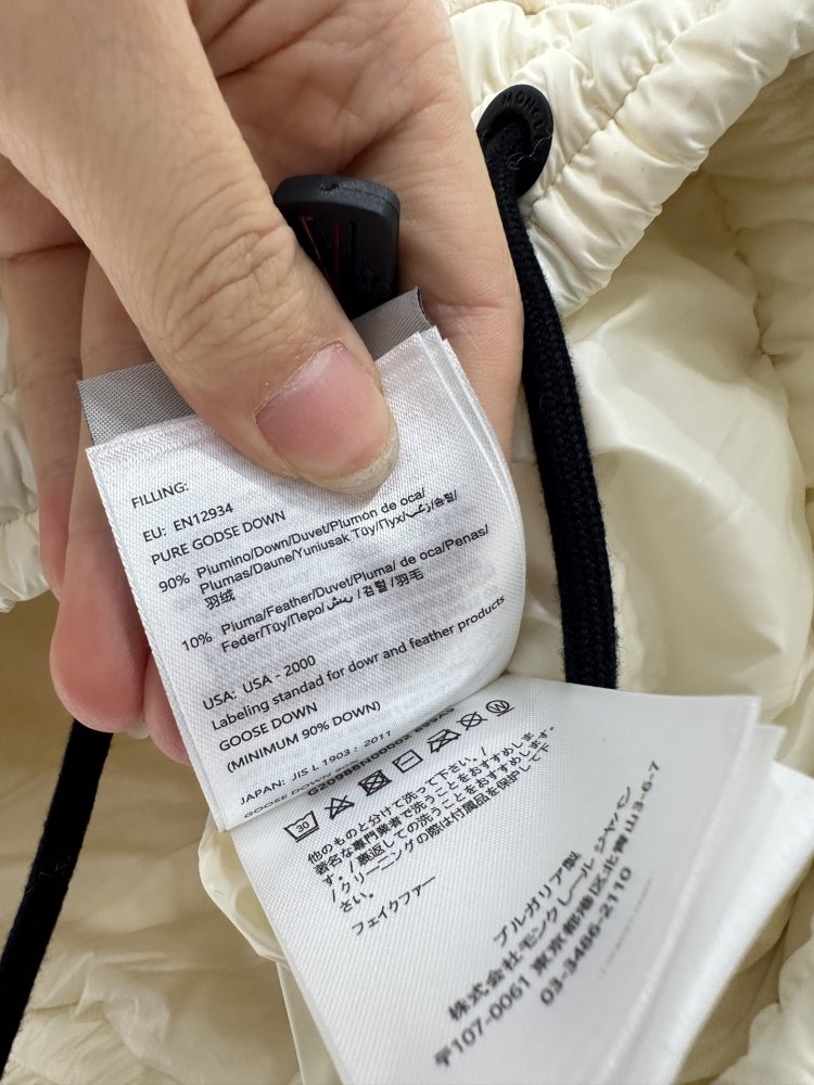 Жилетка на пуху женская фото 9