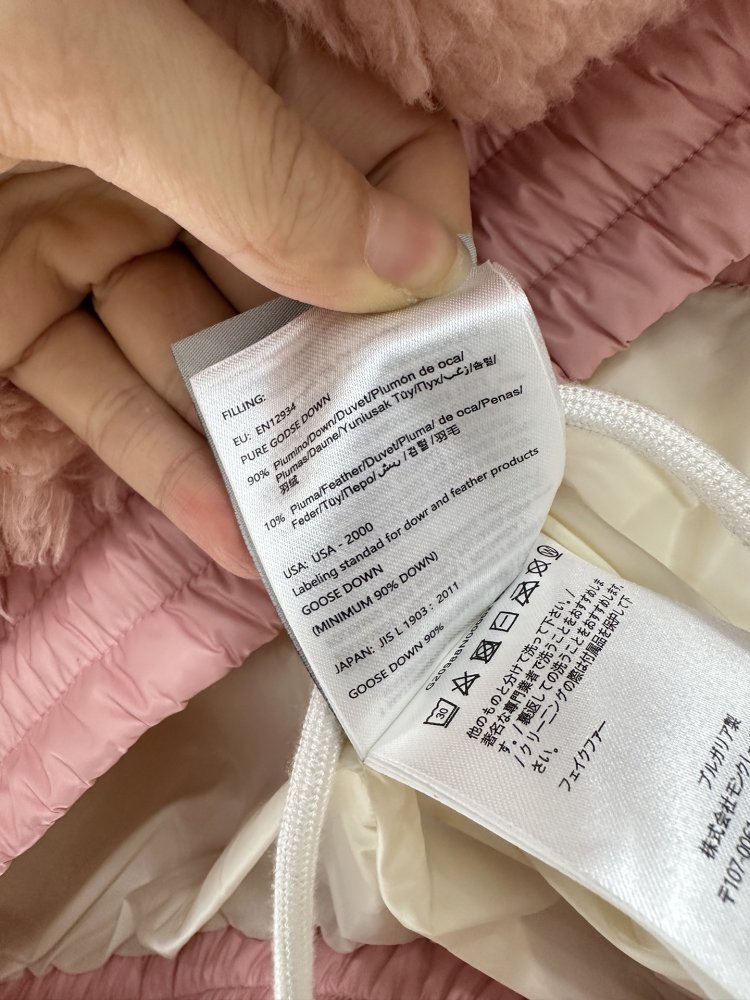 Жилетка на пуху жіноча фото 9