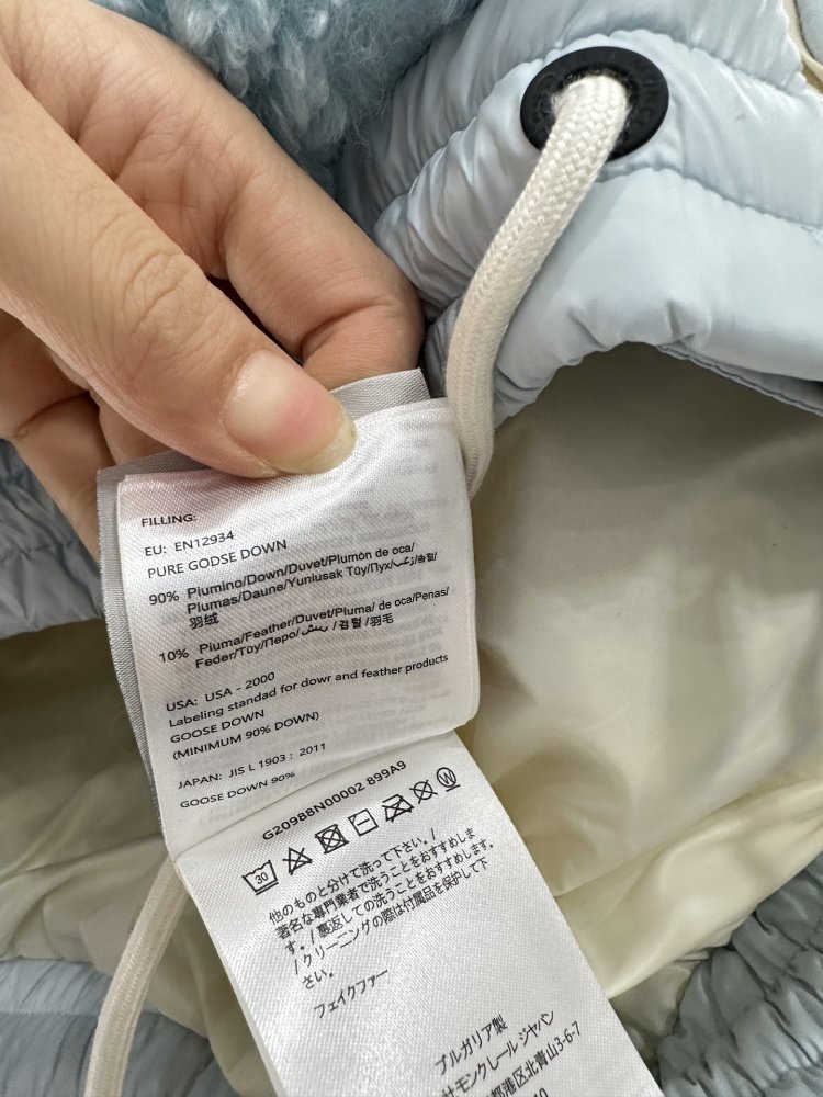 Жилетка на пуху женская фото 9