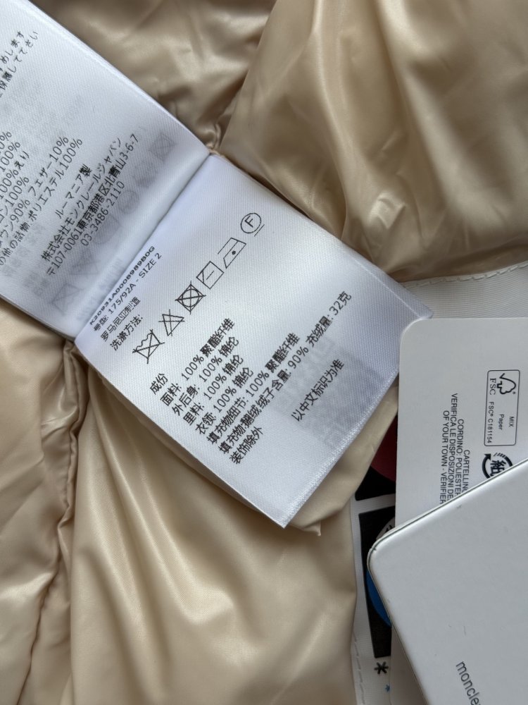 Жилетка на пуху женская фото 9