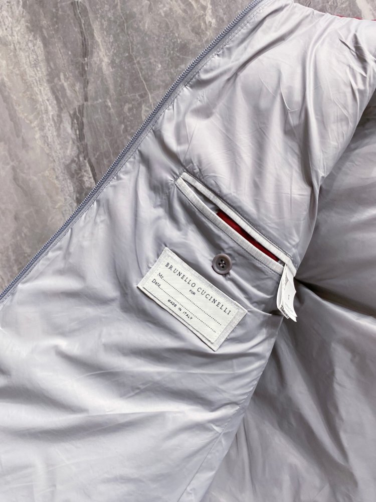 Жилетка на пуху фото 10