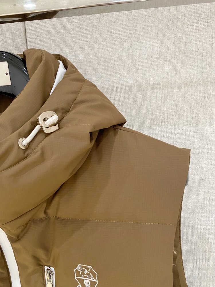 Жилетка на пуху фото 3