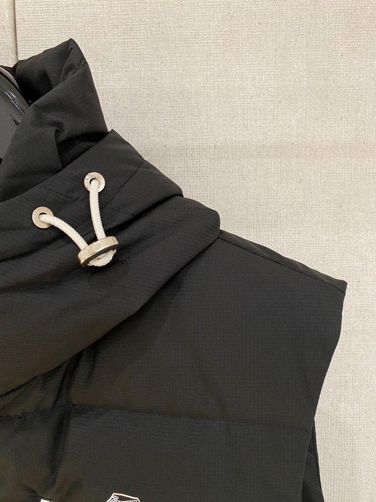 Жилетка на пуху фото 3