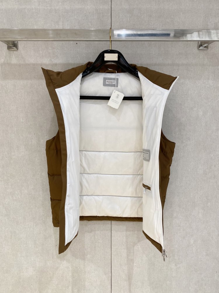 Жилетка на пуху фото 5