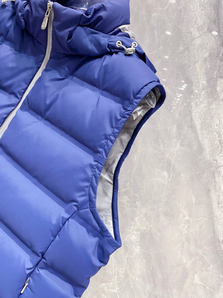 Жилетка на пуху фото 5