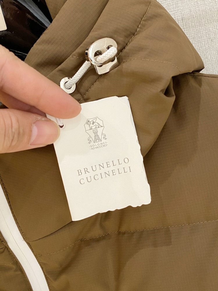 Жилетка на пуху фото 6