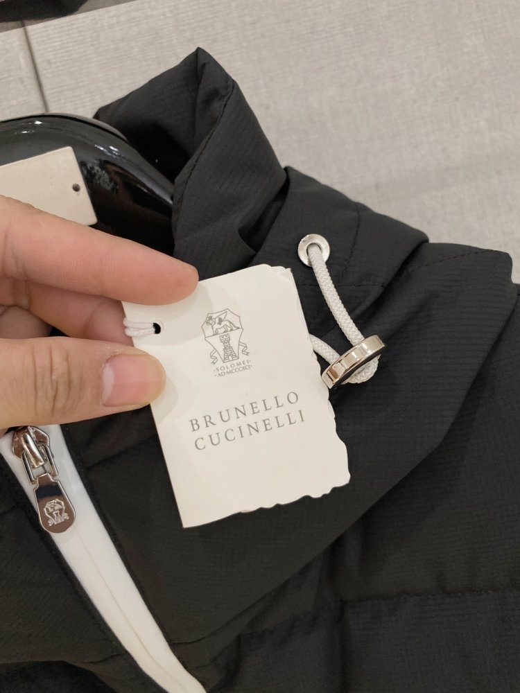 Жилетка на пуху фото 6