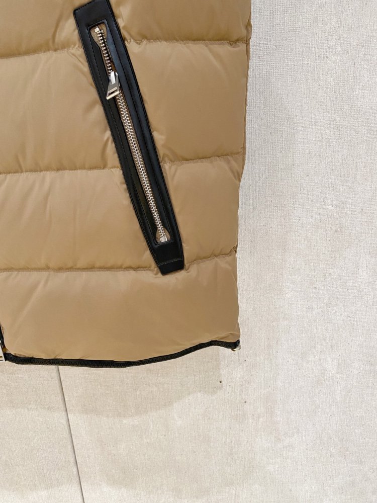 Жилетка на пуху фото 7