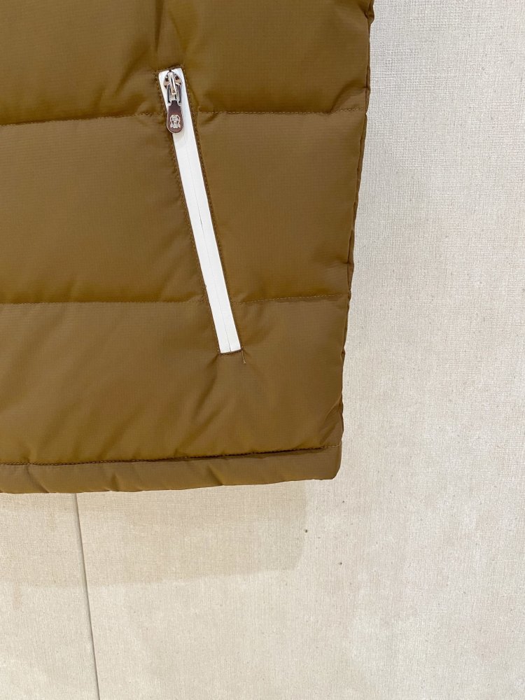 Жилетка на пуху фото 7