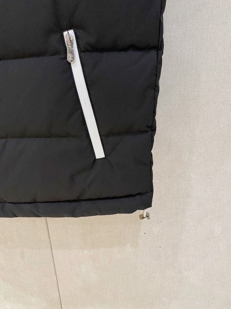 Жилетка на пуху фото 7