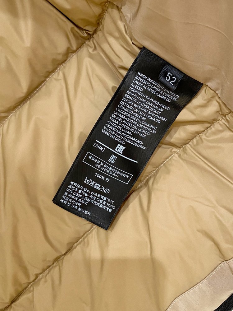 Жилетка на пуху фото 8