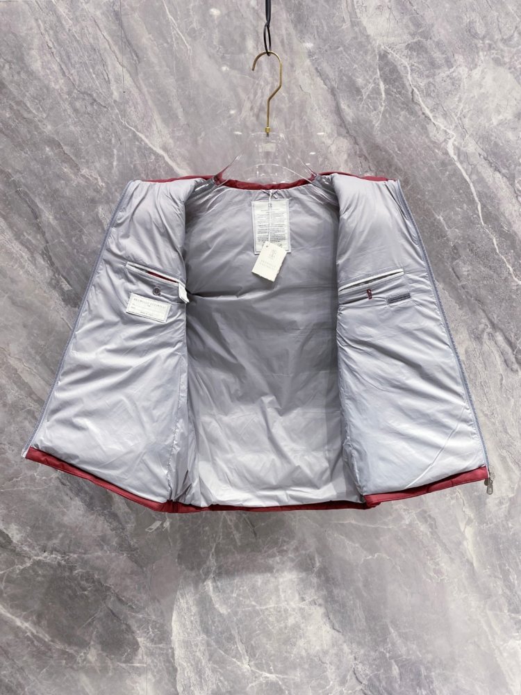 Жилетка на пуху фото 8