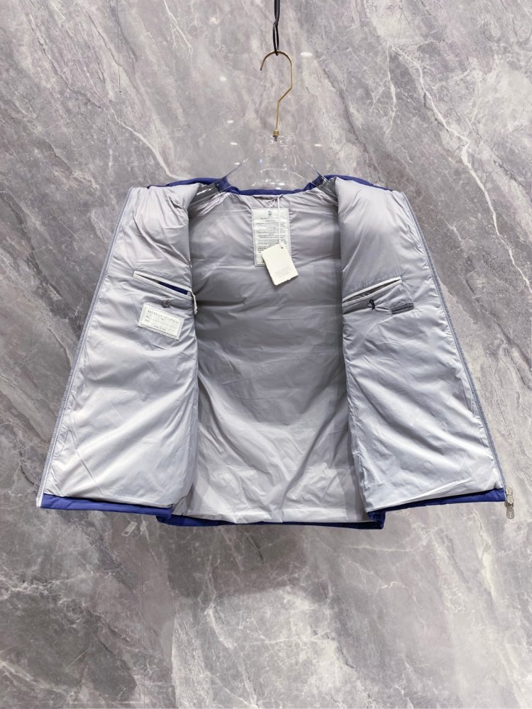 Жилетка на пуху фото 8