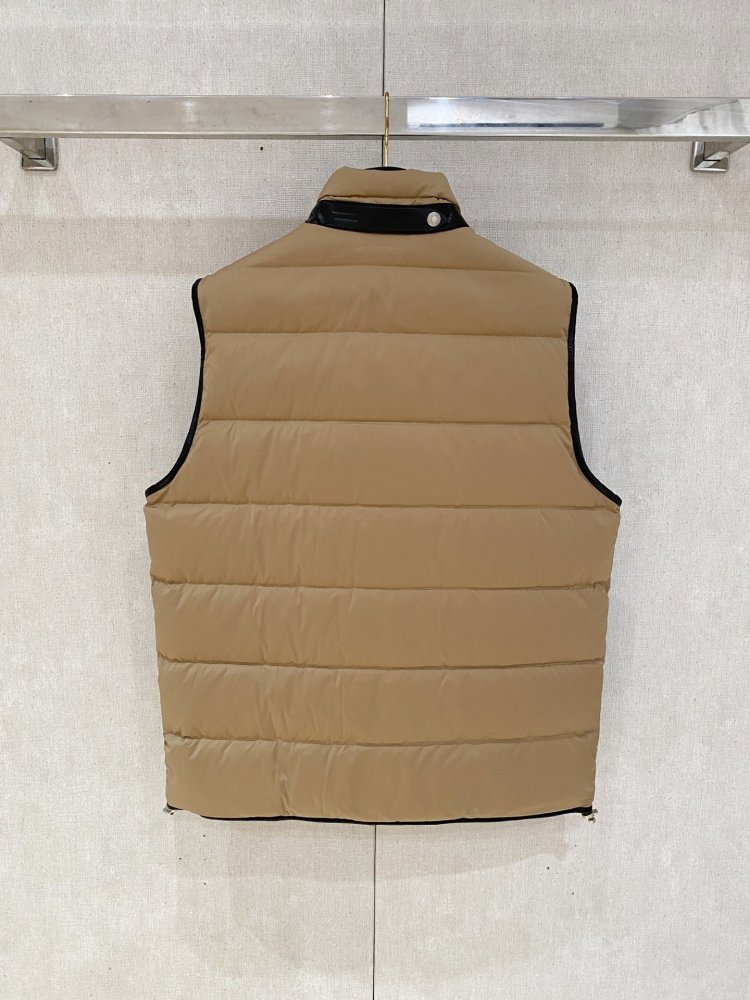 Жилетка на пуху фото 9