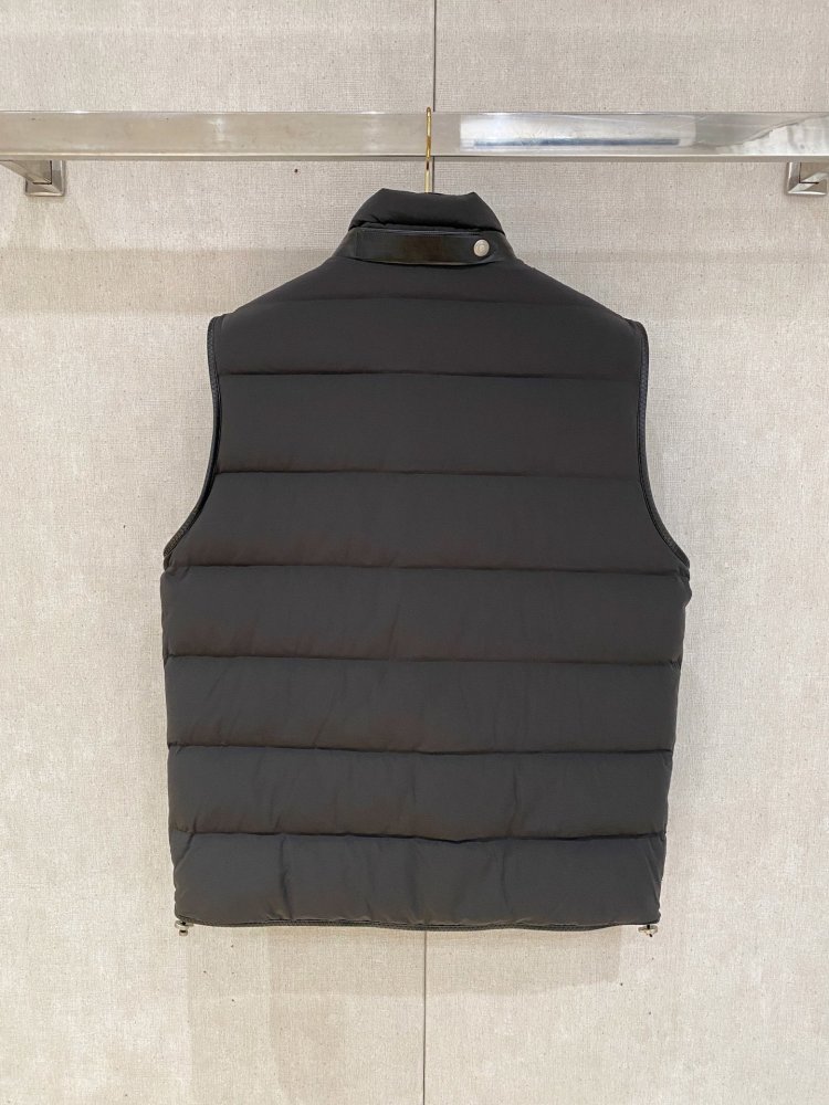 Жилетка на пуху фото 9