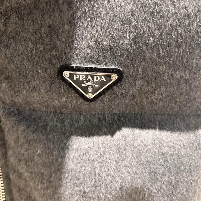 Жилетка женская на пуху с поясом фото 5