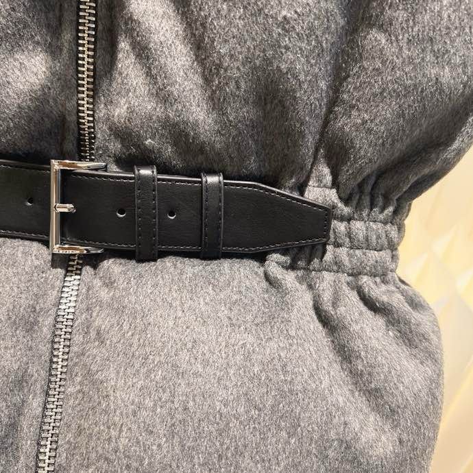 Жилетка женская на пуху с поясом фото 8