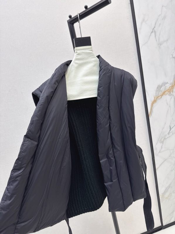 Vest women's on feathers фото 6