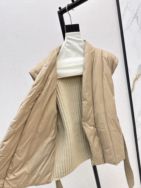 Vest women's on feathers фото 8