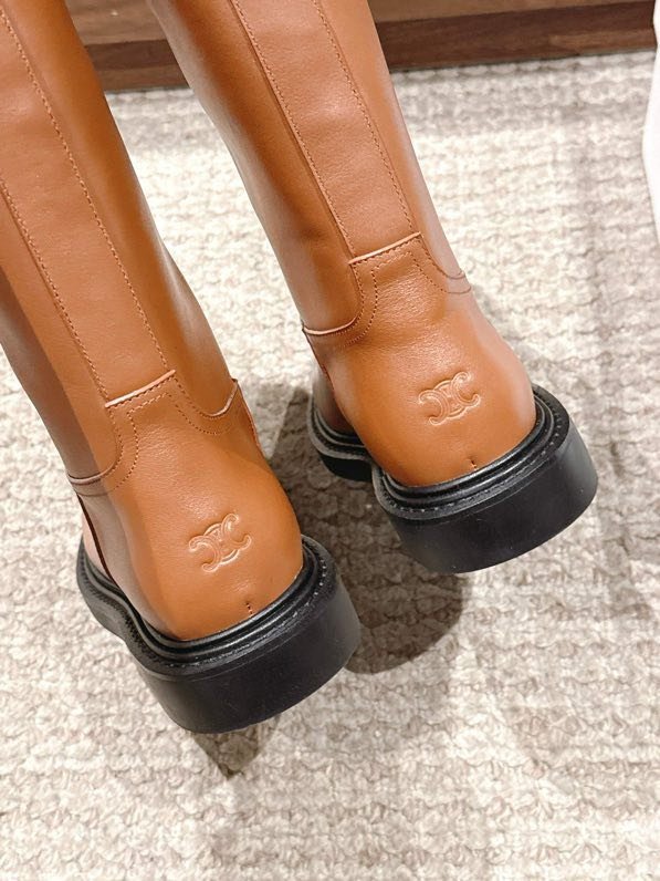 Зимові високі чоботи фото 7